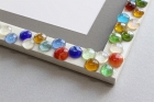 Colored stones, white frame resin detail