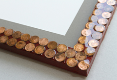 Penny covered collector's picture frame, resin coated
