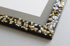 Gold and silver sequins, black frame resin detail