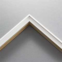 This simplistic yet modular matte white frame is designed for metal prints, acrylic prints and dry mounts up to 1/4 " thickness. This design features a minimalist stepped profile that serves as a floater frame, as the print lays on the inner step of the frame.