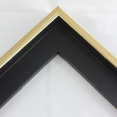 This deep L-shaped canvas floater, features a smooth gently curving face with seamlessly integrated gold w/ black lines, and black side. The face width is 7/16 ", perfect for modern look.