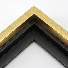 This solid wood canvas floater frame features a glossy brushed gold on the outside edge and topmost face.  The inside step and base are a matte black. 

Display your favourite gallery wrapped Giclée print or painting with authentic, fine art style. This floater frame is ideal for medium to extra large canvases mounted on thick (1.5 " deep) stretcher bars.

*Note: These solid wood, custom canvas floaters are for stretched canvas prints and paintings, and raised wood panels.