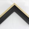 This stair step floating canvas frame in black with brushed gold face reveals an undercoat of black lines, features a shallow recessed stair below the outer face. The canvas will hover neatly, resting on the lowest, flat edge.