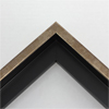 This medium 1 " canvas floater frame comes in a burnished bronze finish and features a slightly rounded profile.