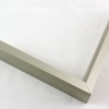 Tall, yet slim 7/16 " metal frame with a hooked profile. This moulding is dark grey silver with a slight brushed texture. It reflects diluted light.
Nielsen n117-14 Profile