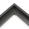 This stair step wood floater frame has a matte black finish with a steep upper and small lower step. The canvas will hover neatly within the simple, modern border. 

Give an authentic, fine art display to your favourite Giclée print or oil painting. This size is ideal for thin (3/4 " deep) gallery wrap canvases. The canvas may protrude slightly above the frame face. 

*Note: These solid wood, custom canvas floaters are for stretched canvas prints and paintings, and raised wood panels.